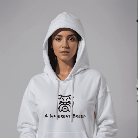 Woman wearing white hoodie with  a print which reads a different breed across the chest